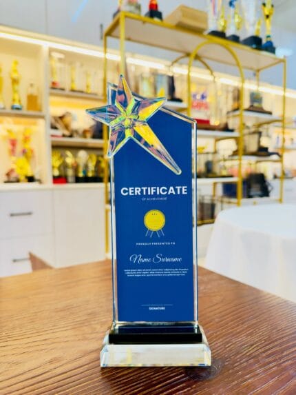 Tall blue custom crystal certificate plaque with raised faceted star accent and layered crystal base
