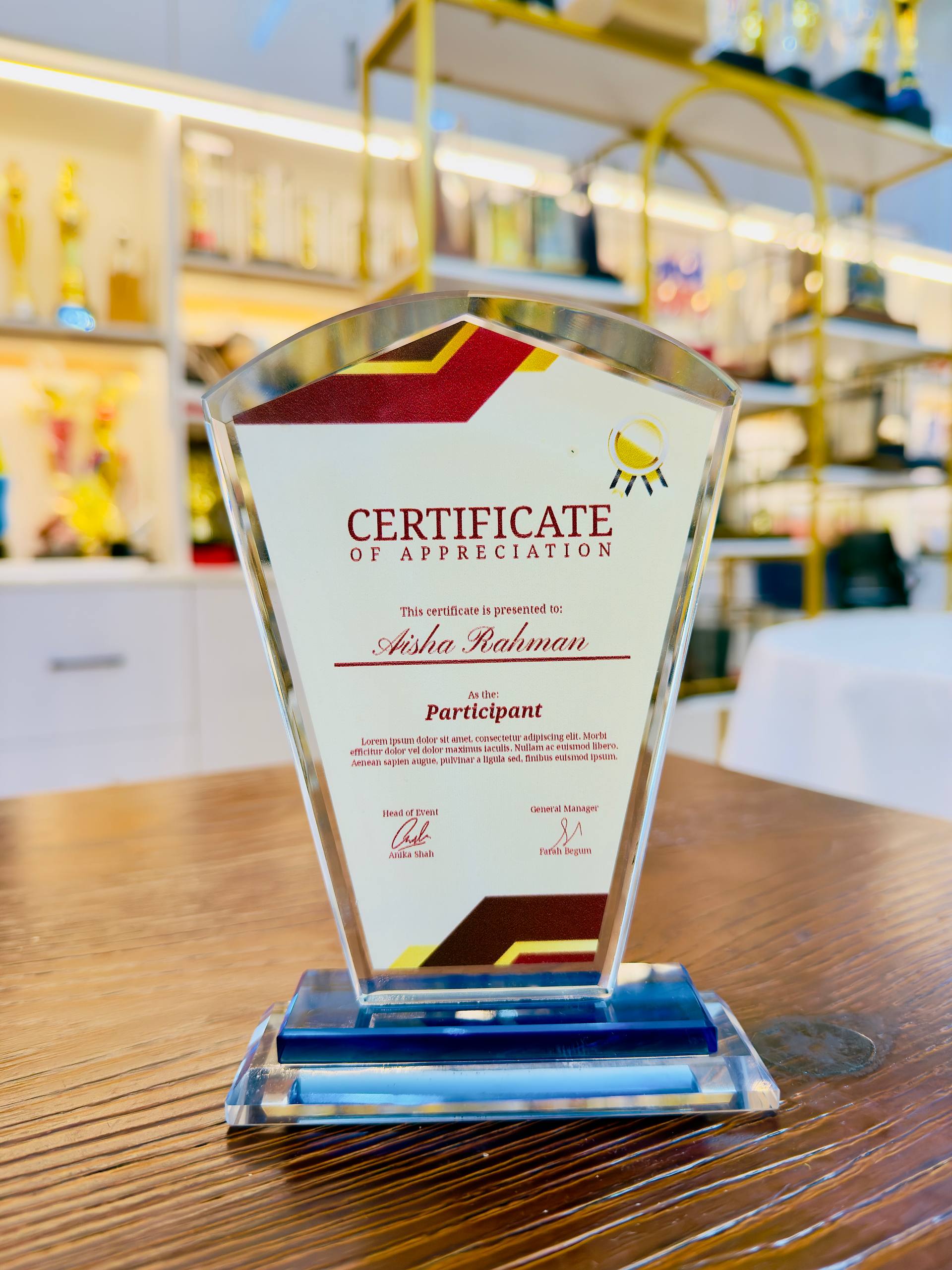 Budget Crystal Plaque 23 With Box – custom appreciation plaque Custom crystal appreciation plaque with faceted pentagon shape, burgundy red and gold printed details, and blue crystal base
