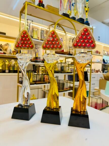 Gold silver and bronze resin snooker trophies with replaceable triangular acrylic tops and black crystal bases