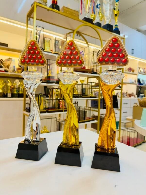 Gold silver and bronze resin snooker trophies with replaceable triangular acrylic tops and black crystal bases