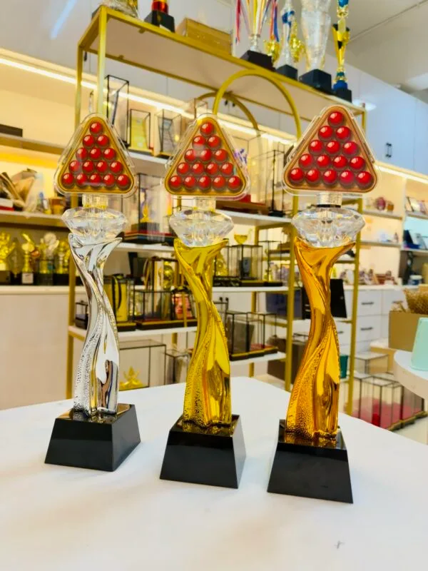 Gold silver and bronze resin snooker trophies with replaceable triangular acrylic tops and black crystal bases