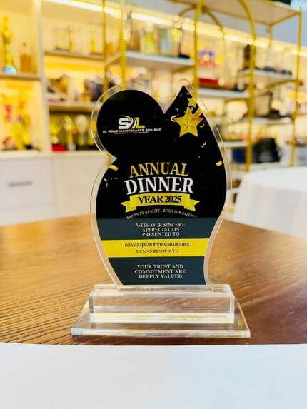 Black and gold custom printed acrylic annual dinner appreciation plaque on a clear acrylic base