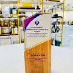 Crystal Plaque 24 with clear curved panel and natural wood base for custom award printing